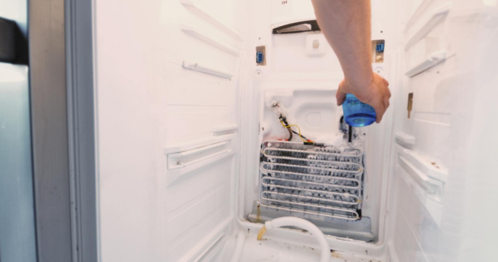 FB Images - Uncle Harry's Appliance Repair School defrosting fridge's insides