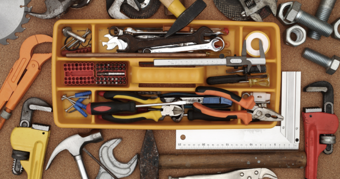 top-down photo of toolbox and tools