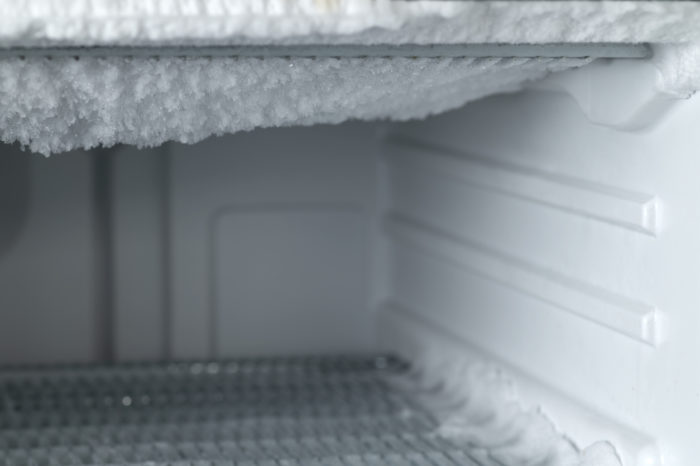 Photograph of an frosted over freezer